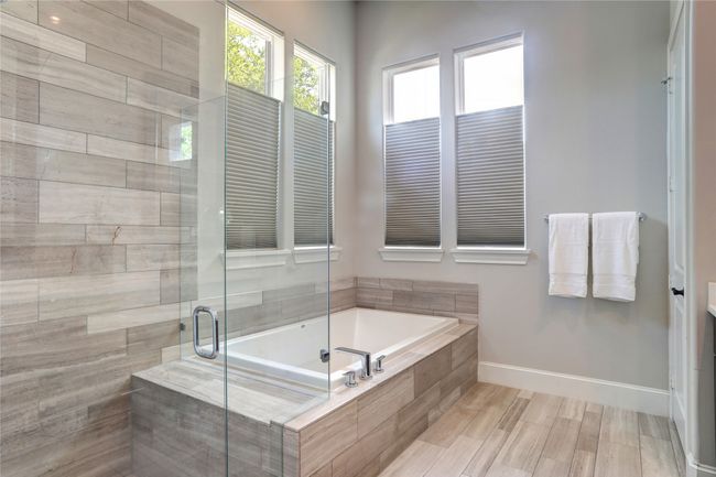 Primary Bathroom with a separate shower, and a garden tub. Elegant finishes. | Image 14