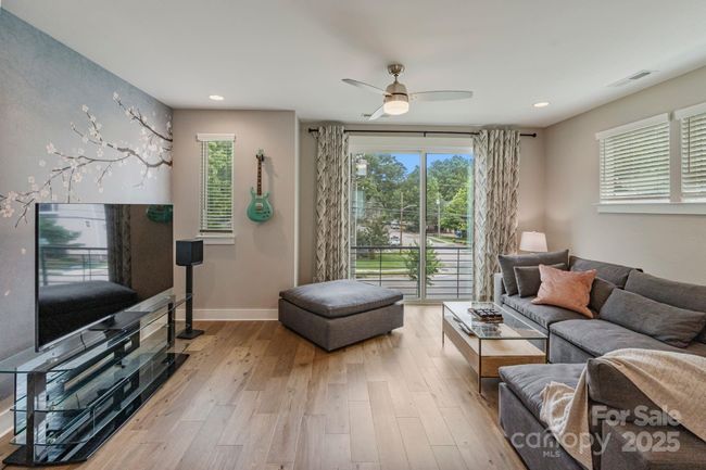 Great room with an abundance of natural light | Image 10