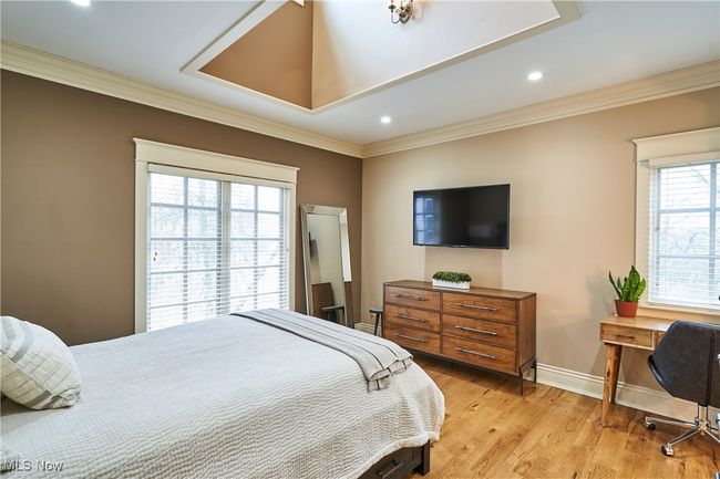 Bedroom 3 has hickory floors, and dormer window to add to the natural light. | Image 20