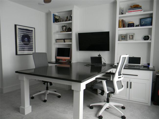 Office at upstairs landing featuring a build-in partner desk and carpet flooring | Image 14