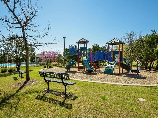 Community playground with a lawn | Image 22