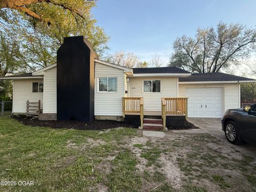 415 W Daugherty St, Carterville, MO, 64835-1443 | Card Image