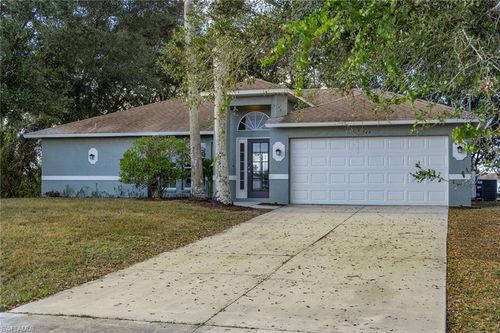 544 Pachman Cir, LEHIGH ACRES, FL, 33974-9480 | Card Image