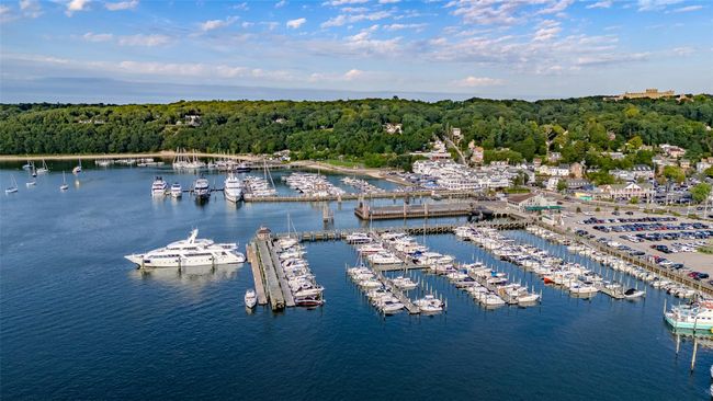 Birds eye view of property with a wooded view and a water view | Image 34