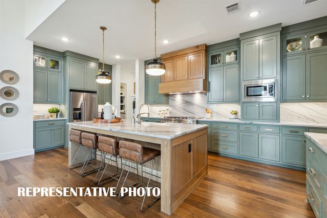 Your chef's dream kitchen comes alive in our Stella floor plan! REPRESENTATIVE PHOTO | Image 5