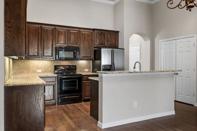dual door pantry, skylight, and ample cabinet space for all your culinary needs. | Image 16