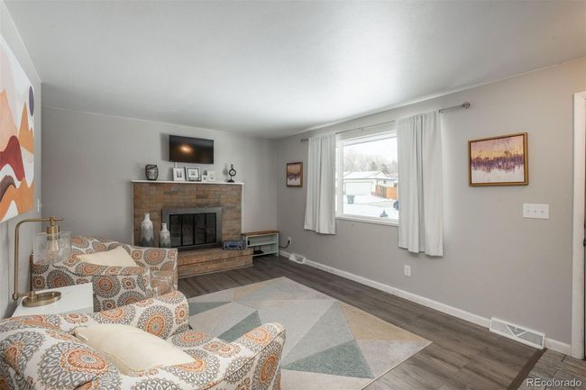 New laminate flooring throughout main level | Image 4