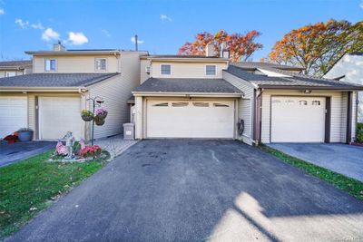 View of property with a garage | Image 2