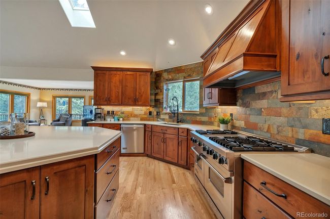 9590 S Warhawk Rd, House other with 4 bedrooms, 4 bathrooms and 3 parking in Conifer CO | Image 11