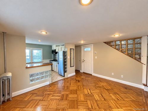 7046 57th Road, New York, NY, 11378 | Card Image