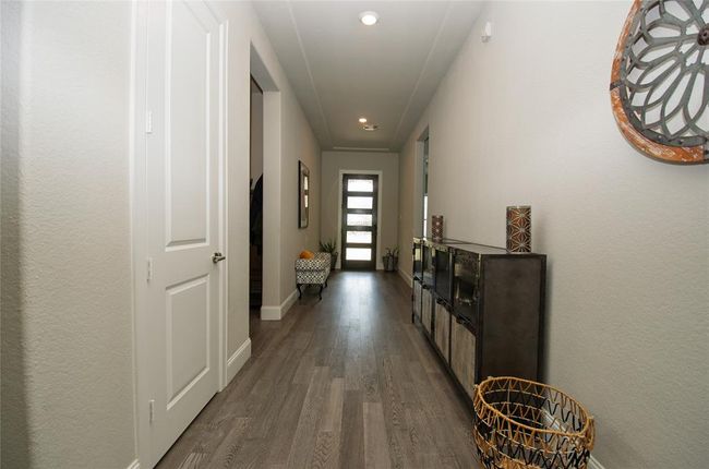 Wide open entry way with upgraded full light privacy front door. | Image 19