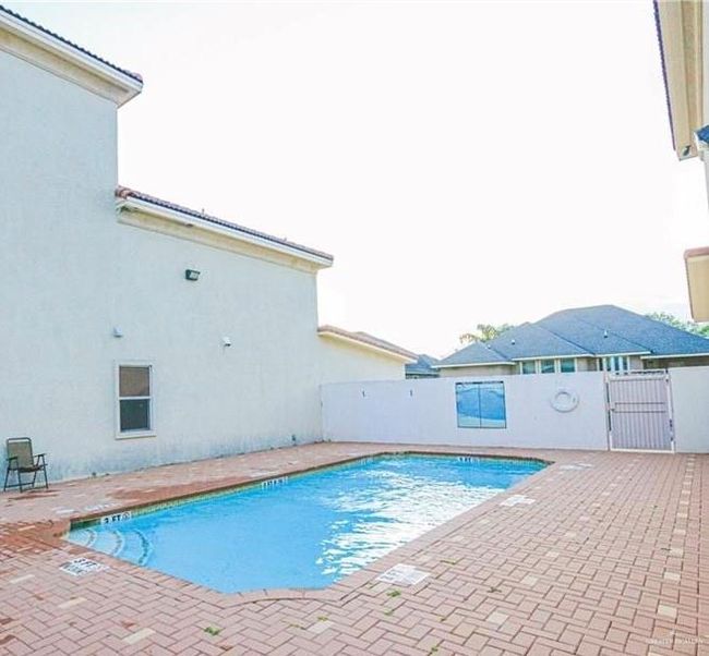 View of pool featuring a patio | Image 13