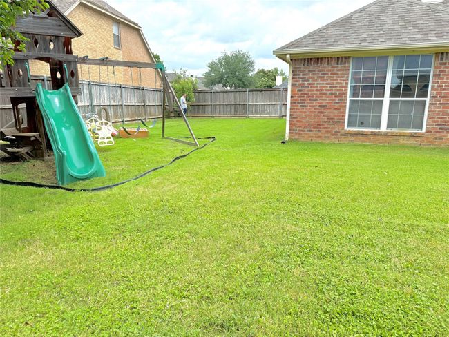 View of yard with a playground | Image 20