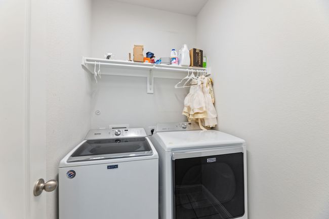 Laundry room downstairs | Image 9