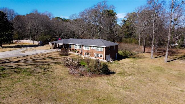 4983 Arcado Rd Sw, House other with 5 bedrooms, 2 bathrooms and 6 parking in Lilburn GA | Image 4