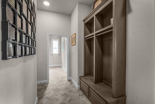 Large mudroom with pocket door to utility room | Image 16