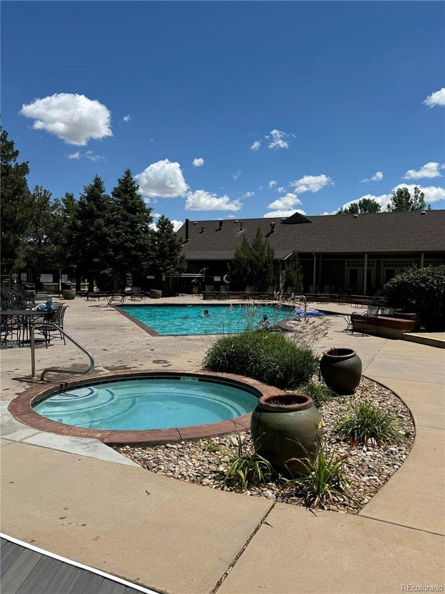 View of the gorgeous clubhouse pool and hot tub. | Image 24