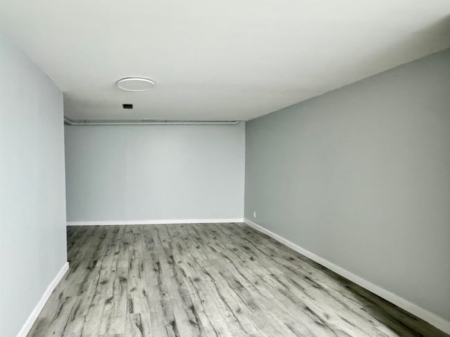 Empty room featuring wood finished floors and baseboards | Image 19