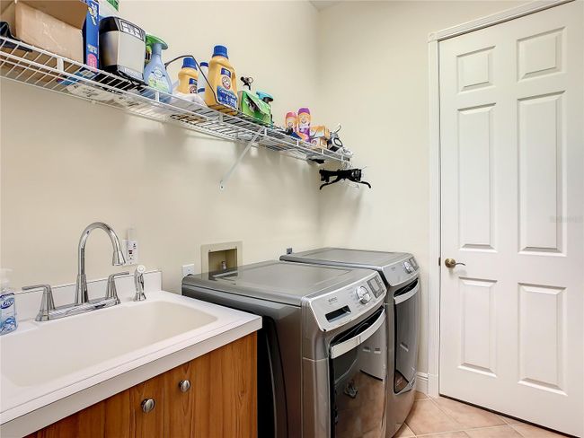 Laundry room with a storage room! | Image 50