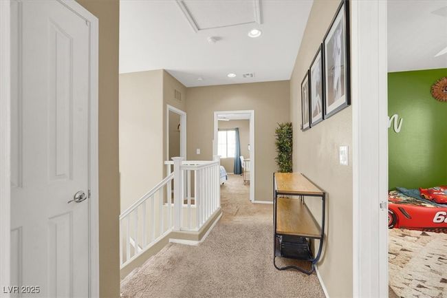 Corridor featuring an upstairs landing, carpet floors, and recessed lighting | Image 13