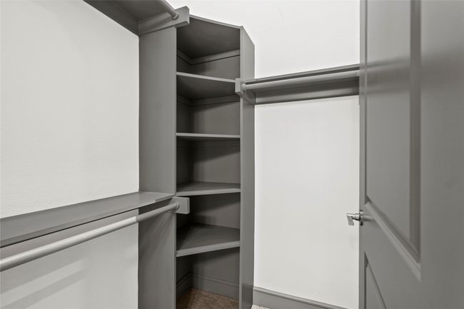 View of spacious closet | Image 18