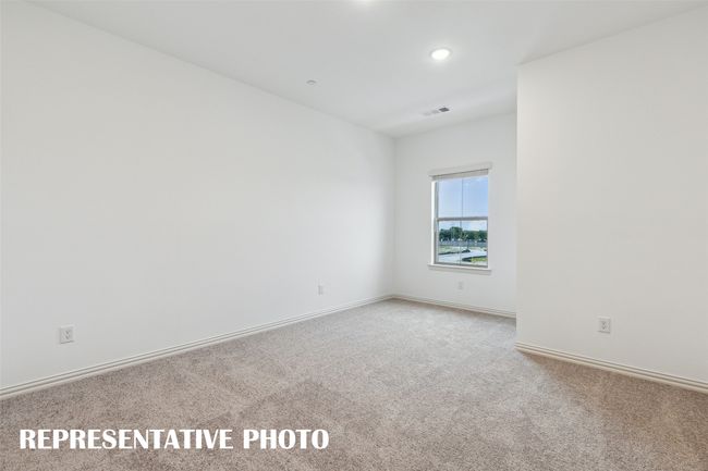 You'll find nicely sized secondary bedrooms in our Emily floor plan. REPRESENTATIVE PHOTO | Image 14