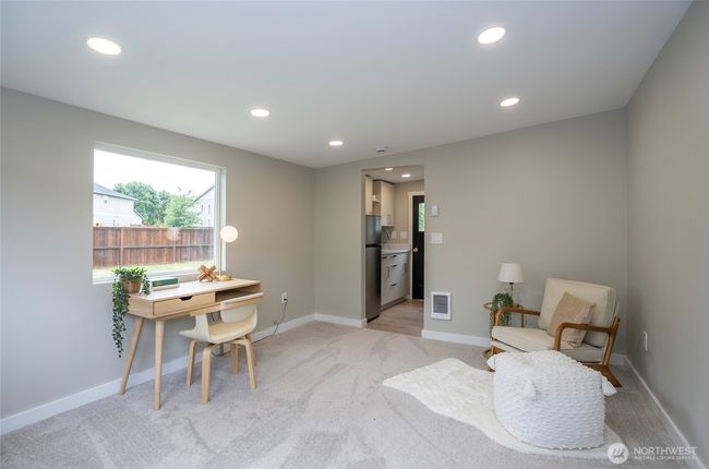 The studio offers a refrigerator, sink, and bathroom. | Image 25