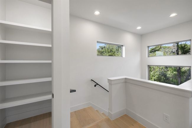 Stairs featuring recessed lighting, baseboards, and wood finished floors | Image 23