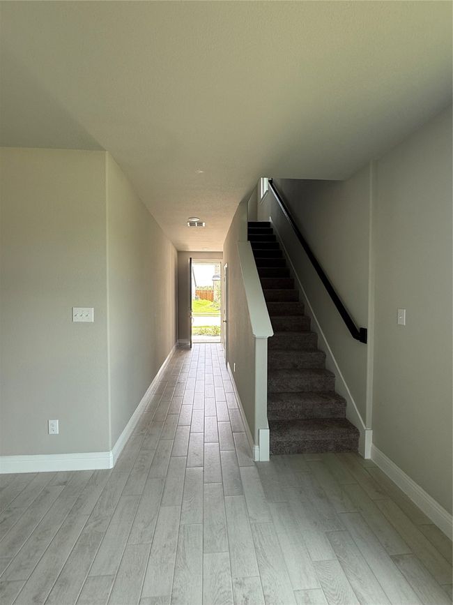 Stairs with wood finished floors | Image 4