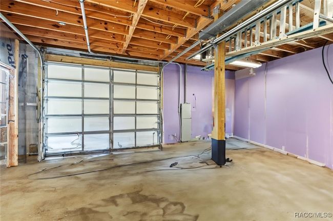 shop has two garage doors, upstairs and half bath with lab | Image 29