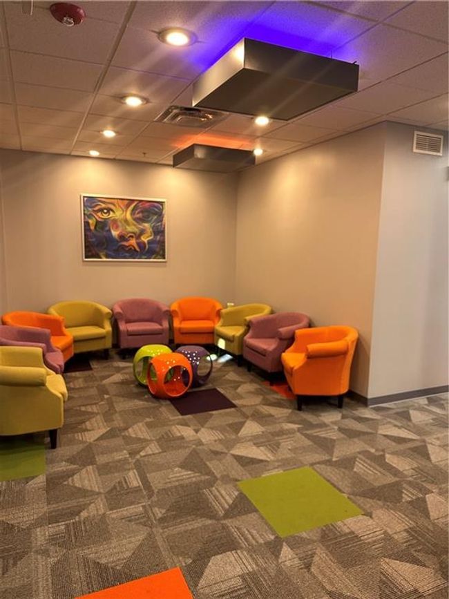 Rec room featuring a paneled ceiling and dark carpet | Image 5