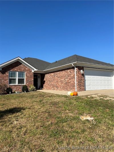 7608 Samuel Drive, Home with 3 bedrooms, 2 bathrooms and null parking in Sellersburg IN | Image 1