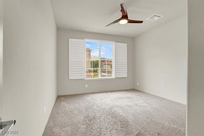 Carpeted empty room featuring ceiling fan and baseboards | Image 29