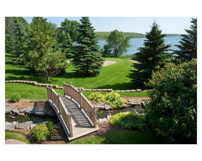 Taking a stroll through the gardens over the bridge, still sipping your morning coffee | Image 5