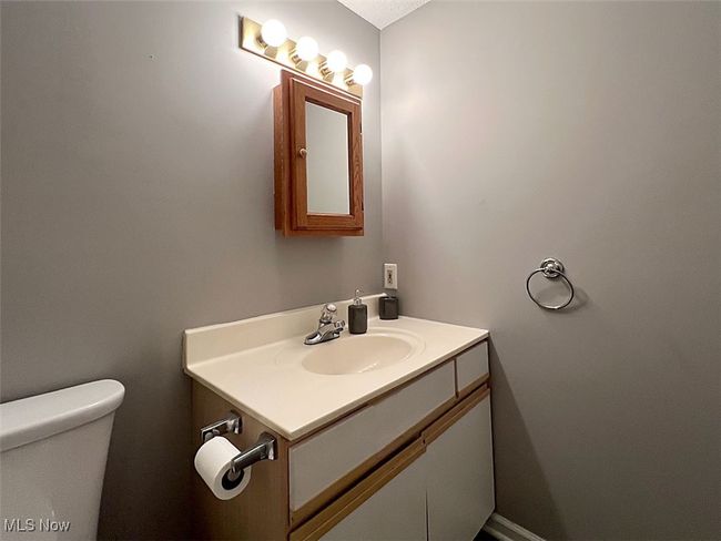 Laundry/full bathroom featuring vanity toilet and shower | Image 19