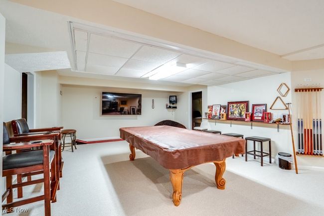 Rec room with carpet and billiards table | Image 36