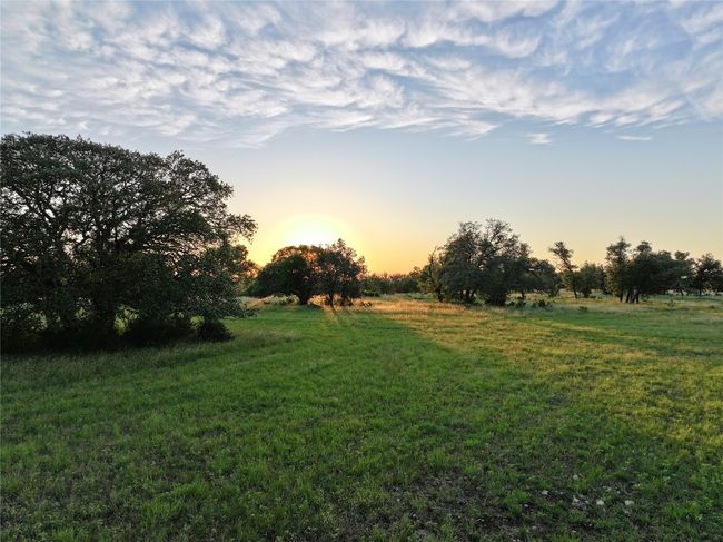 View of green lawn featuring a view of rural / pastoral area | Image 30