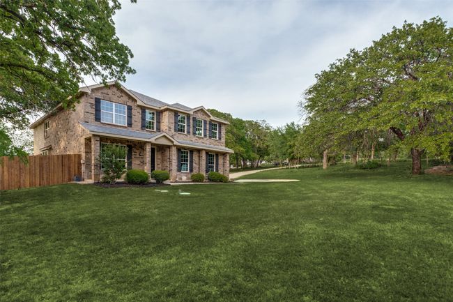 View of front of home featuring brick siding | Image 28