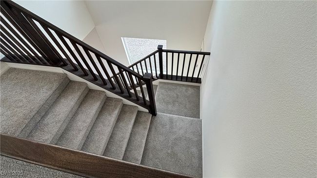 Staircase with a textured wall | Image 16
