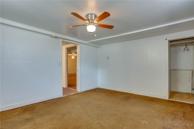 2nd unit bedroom featuring ceiling fan and carpet floors | Image 38