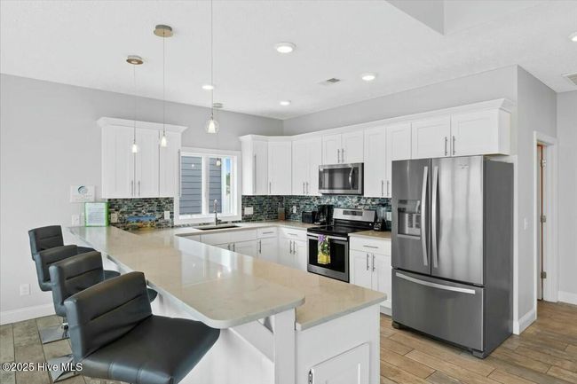 447 E Fourth St, House other with 6 bedrooms, 7 bathrooms and null parking in Ocean Isle Beach NC | Image 13