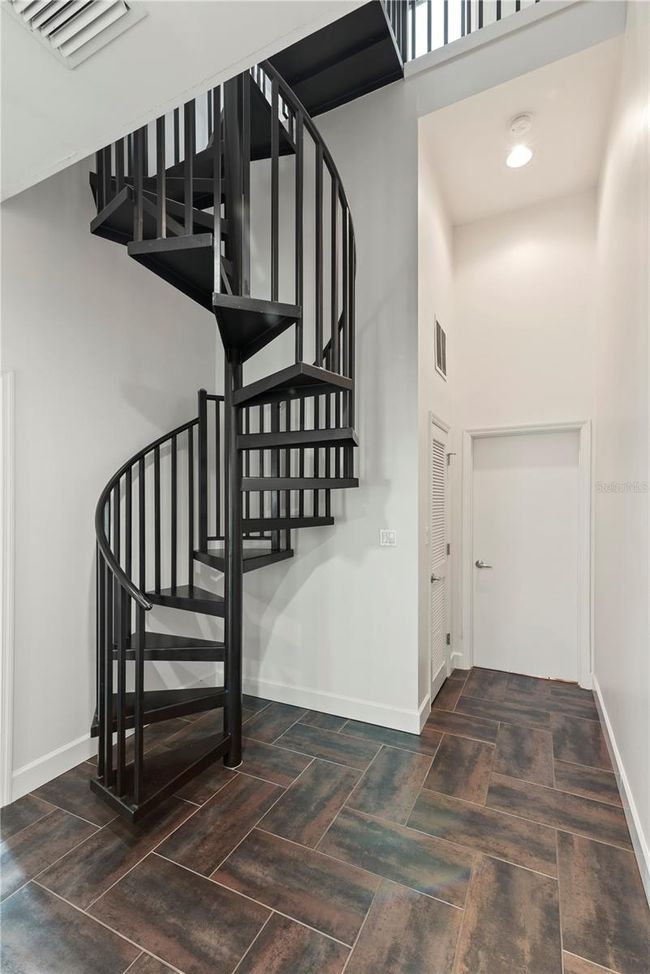 SPIRAL STAIRCASE FROM THIRD FLOOR LEADING TO ROOFTOP DECK/HOTTUB | Image 21