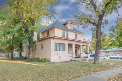 View of front of property featuring a porch and a front lawn | Image 2