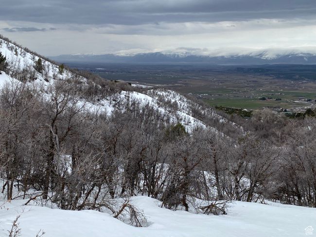 Snowy aerial view featuring a mountain view | Image 5