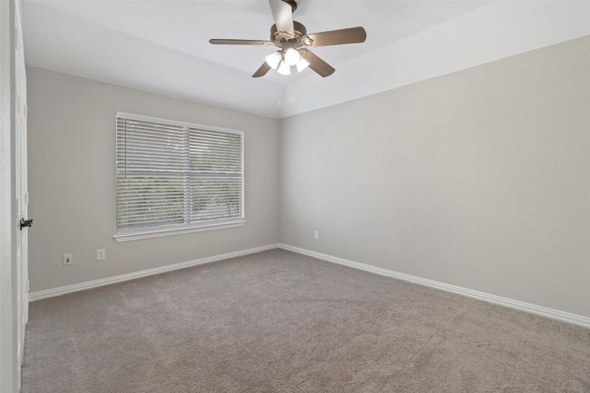 Unfurnished room with carpet floors and ceiling fan | Image 24