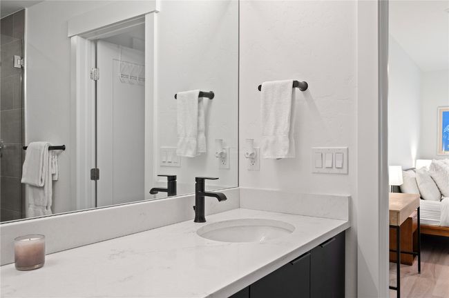 Bathroom featuring hardwood / wood-style floors and vanity | Image 21