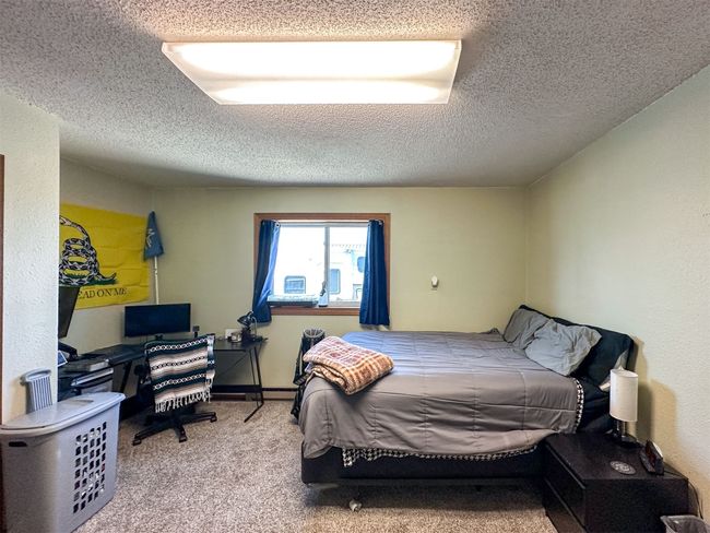 Bedroom in basement | Image 49