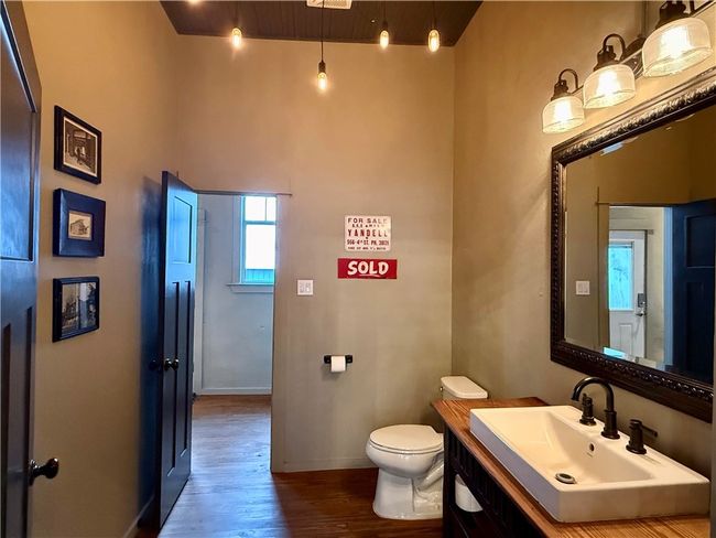 Bathroom with hardwood / wood-style flooring, vanity, and toilet | Image 8