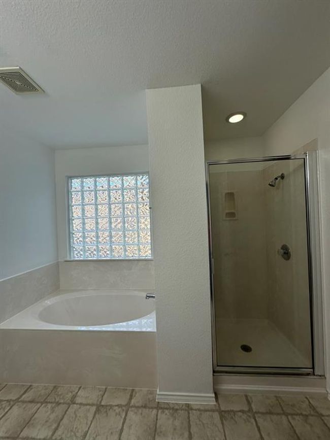 Full bath with a garden tub, a shower stall, a textured ceiling, and recessed lighting | Image 11