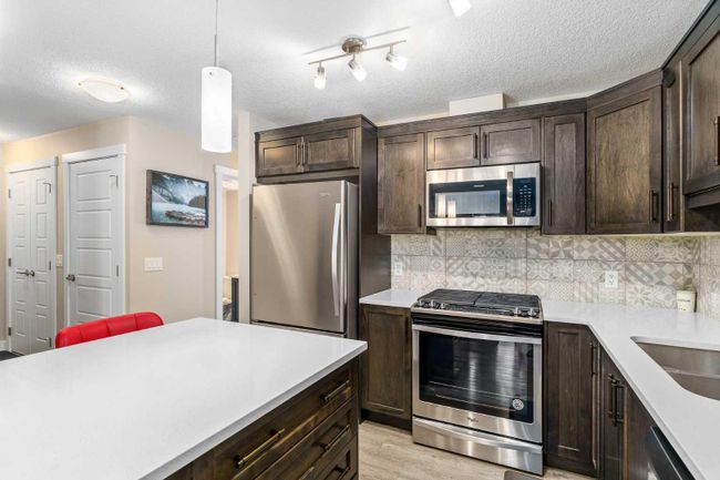 907 Cranbrook Walk Se, Home with 2 bedrooms, 1 bathrooms and 2 parking in Calgary AB | Image 10
